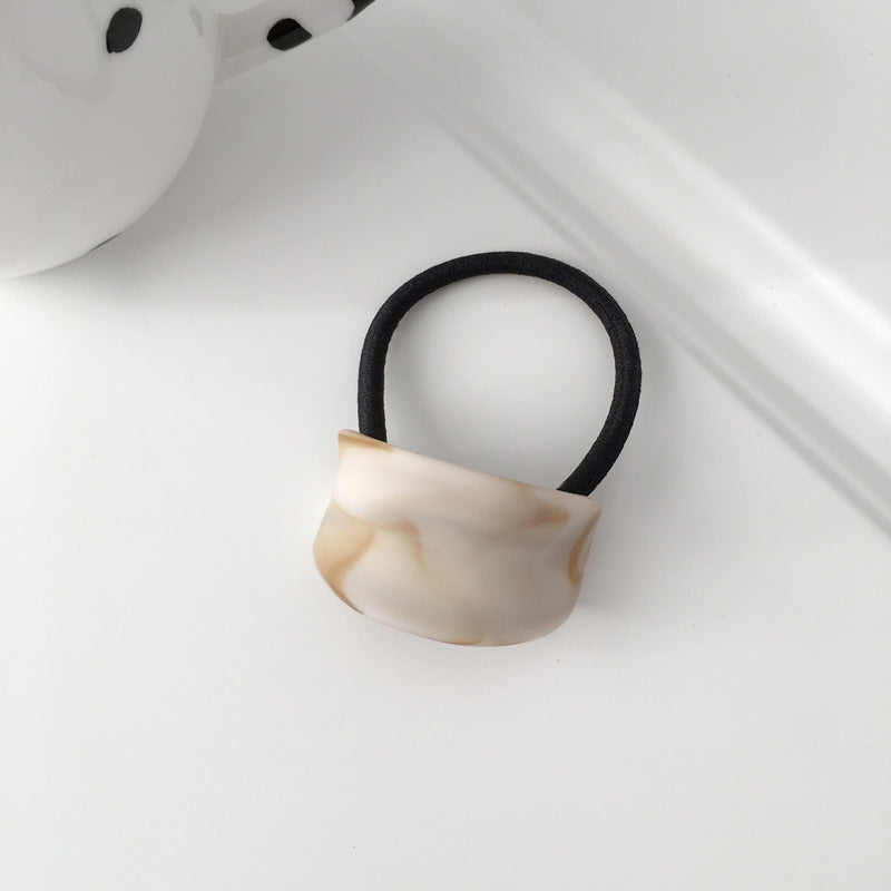 wood grain girl ponytail hair tie