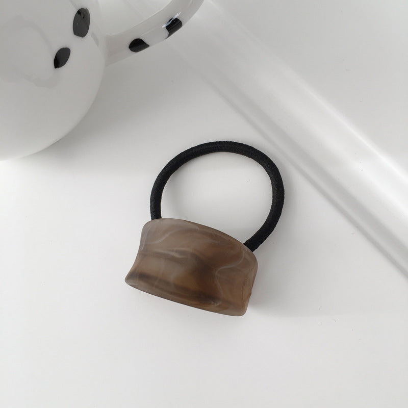 wood grain girl ponytail hair tie