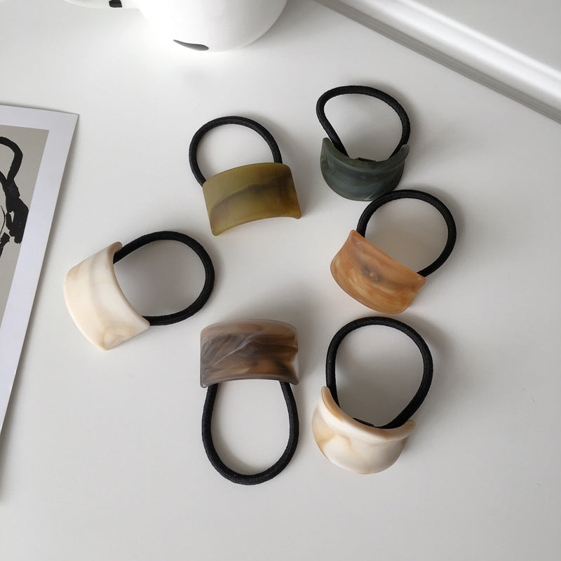 wood grain girl ponytail hair tie