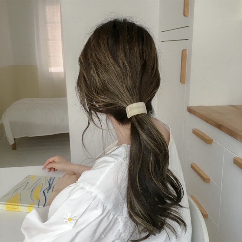 wood grain girl ponytail hair tie