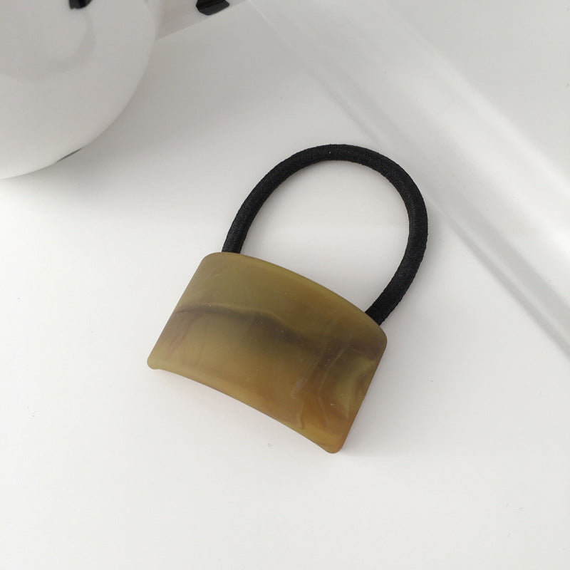 wood grain girl ponytail hair tie