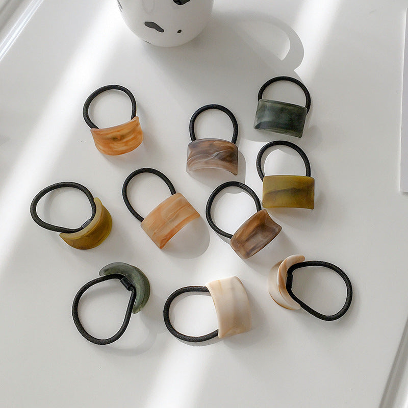 wood grain girl ponytail hair tie