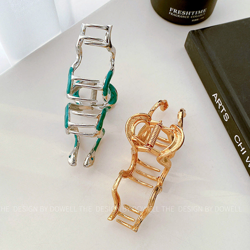 snake-shaped metal hair claw
