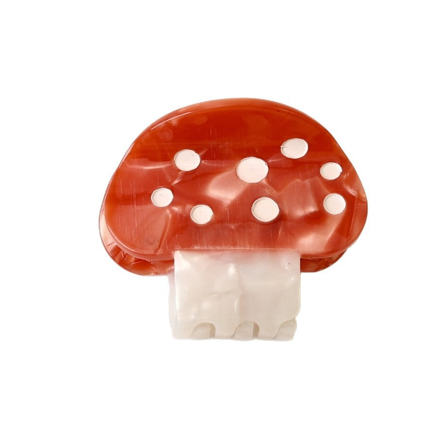 Colorful small mushroom hair claw