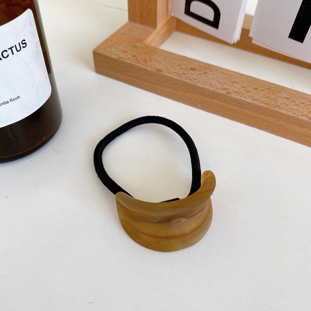 wood grain girl ponytail hair tie