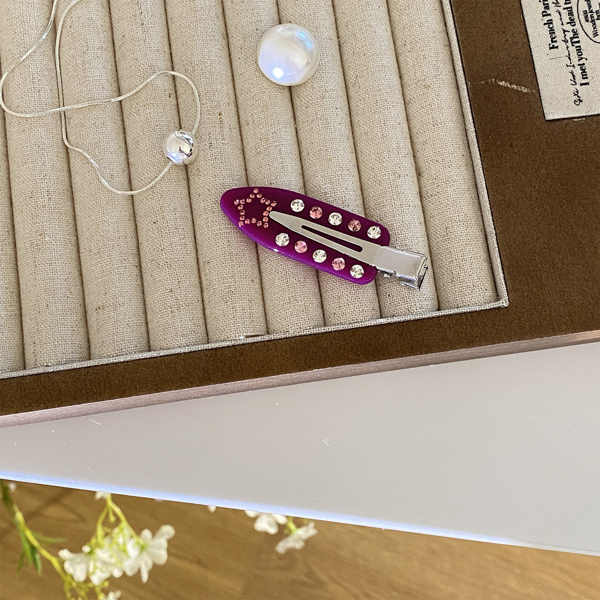Diamond-encrusted seamless Hair Clip