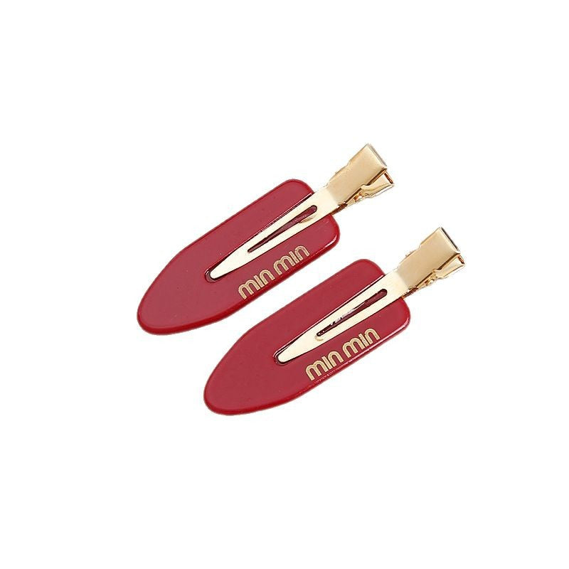 Solid-color seamless hair clip for makeup application