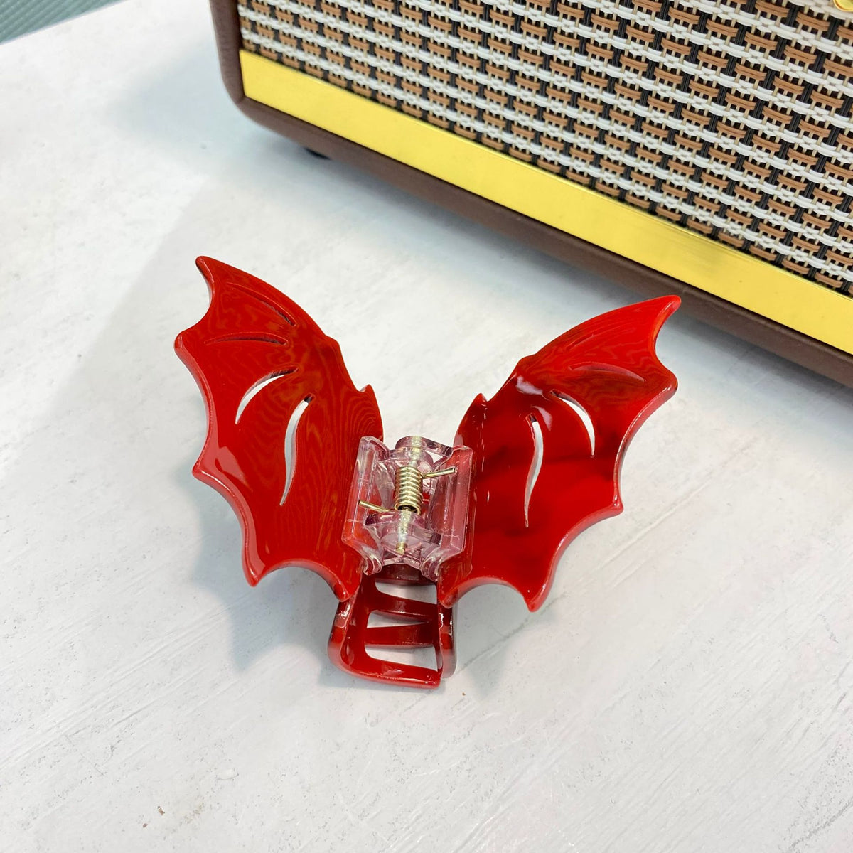 halloween hair claw - pumpkin, bat, ghost, and skull designs