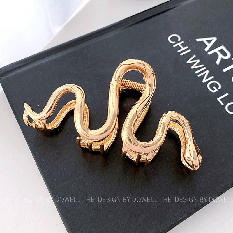 snake-shaped metal hair claw