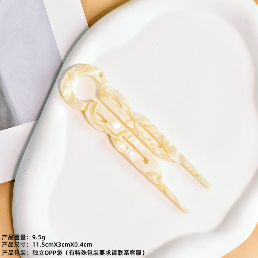 U-shaped acetic acid hairpin