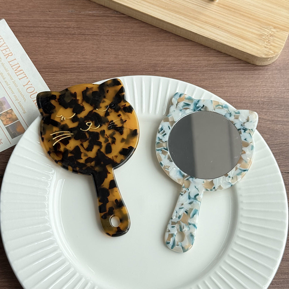 shell kitten handheld mirror