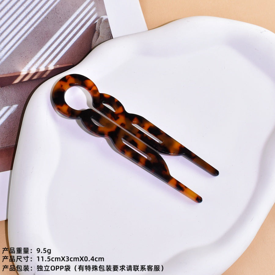 U-shaped acetic acid hairpin