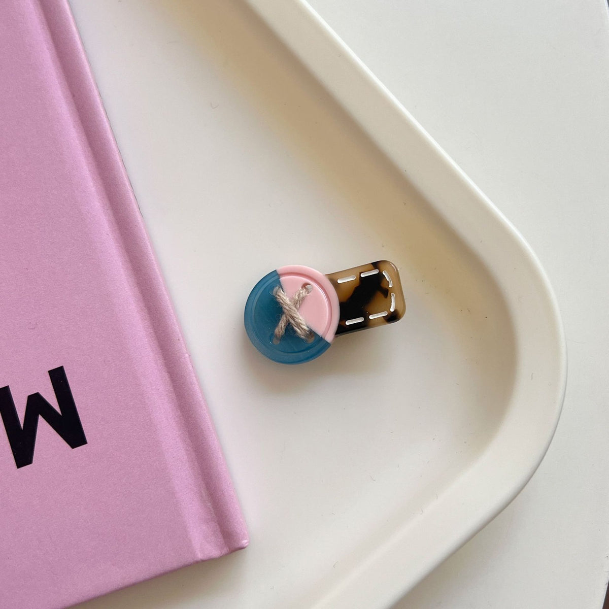 button hair clip