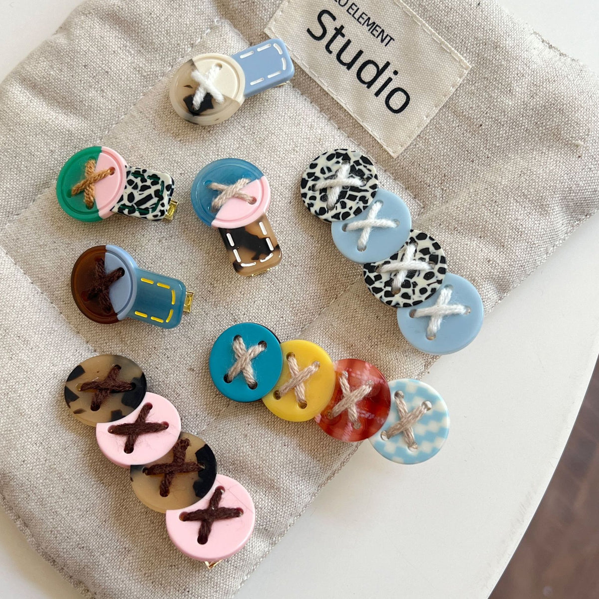 button hair clip