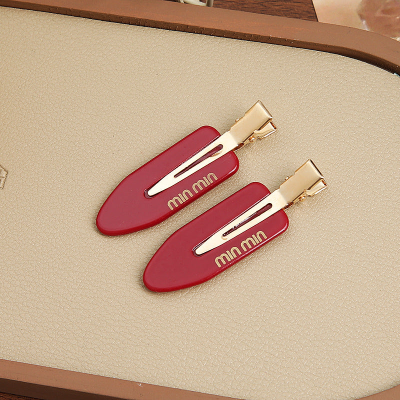 Solid-color seamless hair clip for makeup application