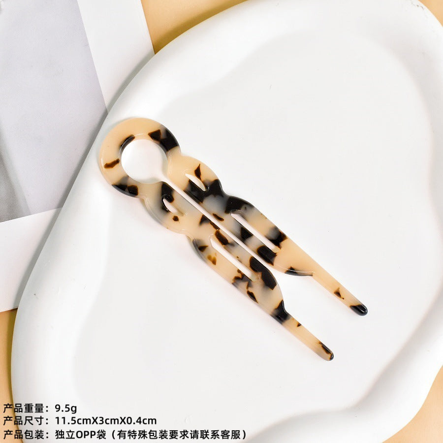U-shaped acetic acid hairpin