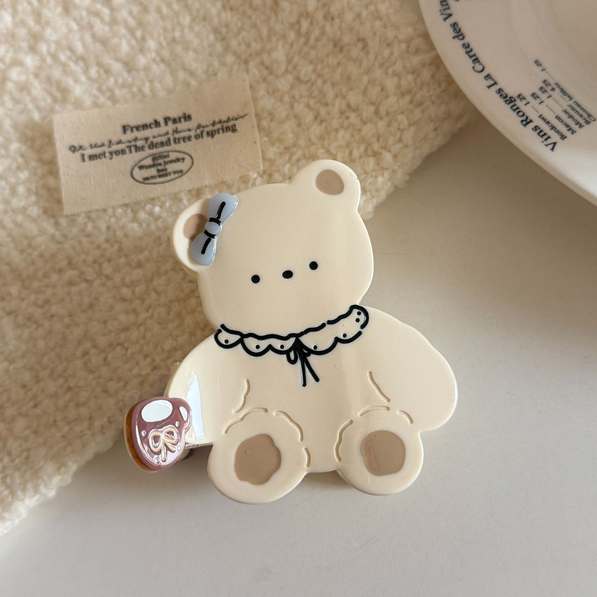 Cream cartoon bow tie bear hair claw