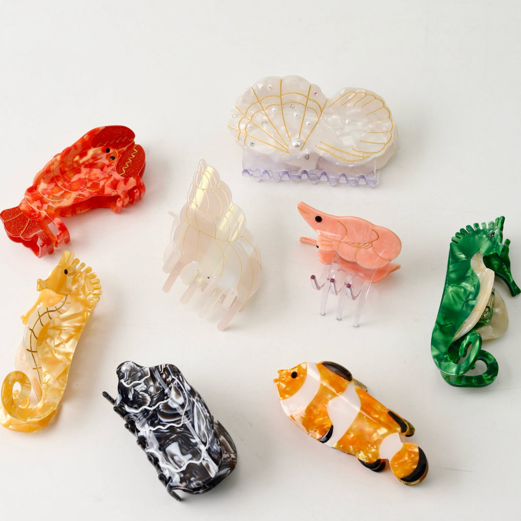 Ocean lobster seahorse conch hair claw