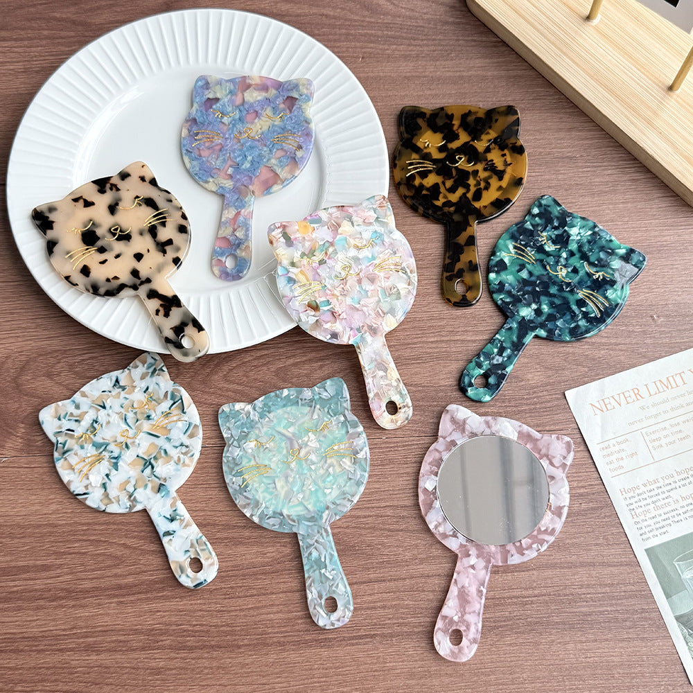 shell kitten handheld mirror