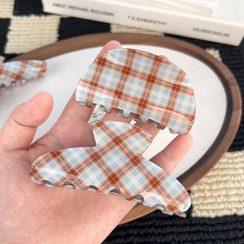 brown and blue plaid hair claw