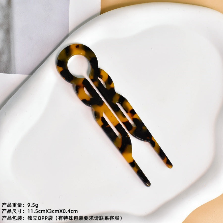 U-shaped acetic acid hairpin