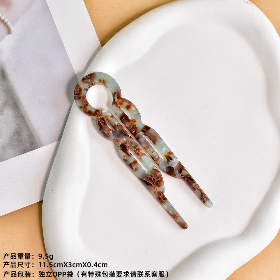 U-shaped acetic acid hairpin