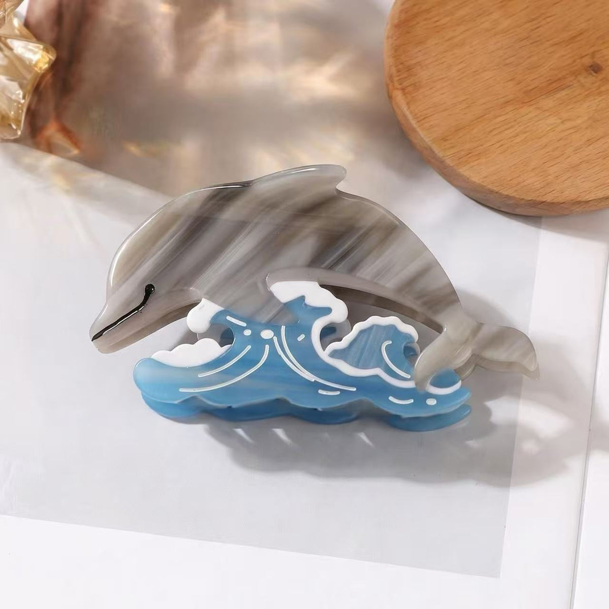 marine wind dolphin hair claw