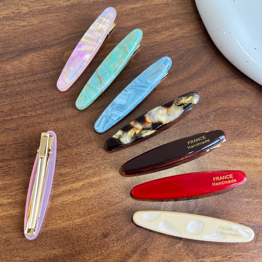 Elliptical straight clip hair claw