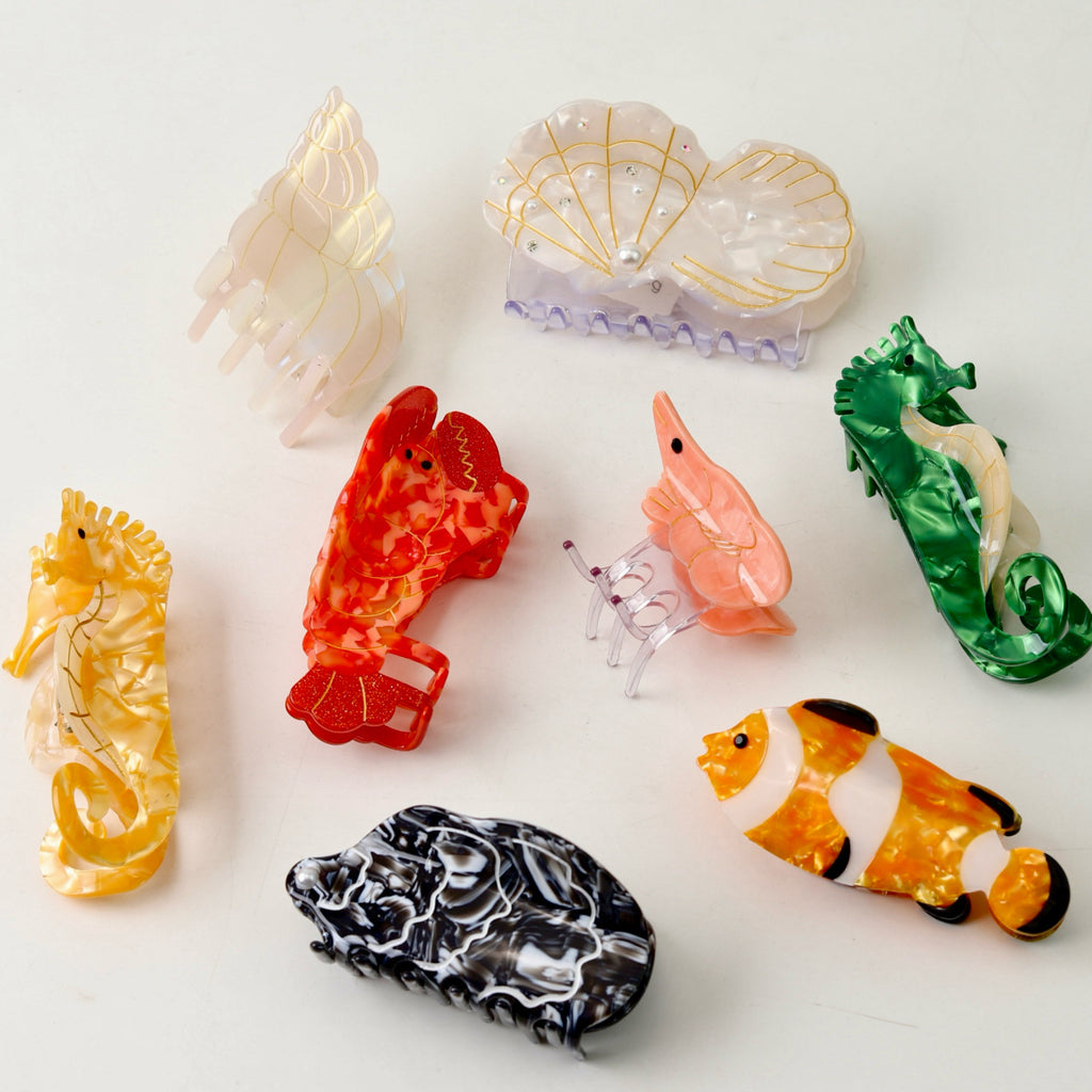 Ocean lobster seahorse conch hair claw
