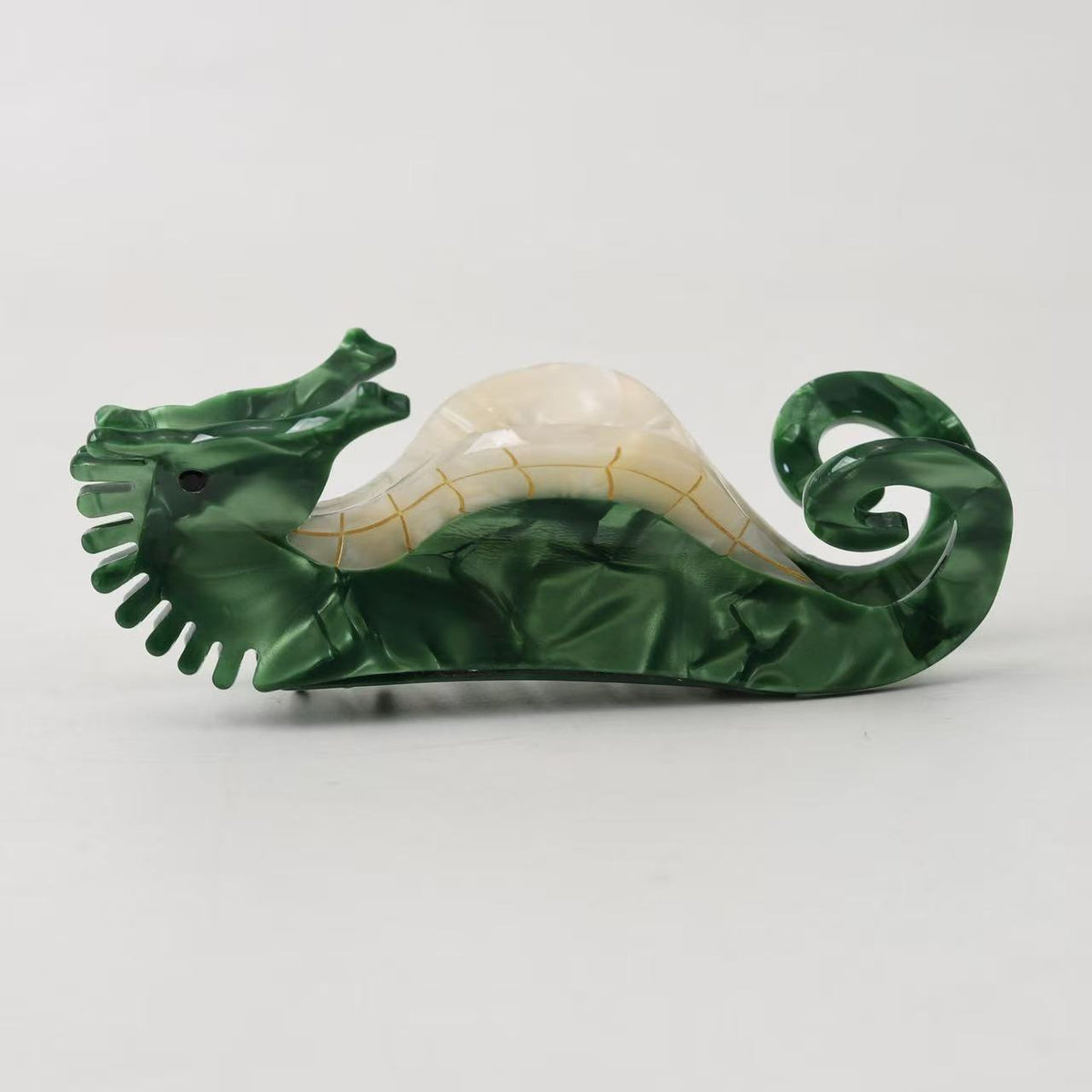 Ocean lobster seahorse conch hair claw