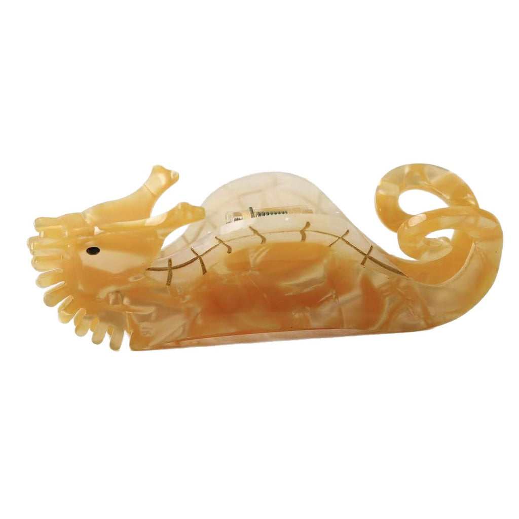 Ocean lobster seahorse conch hair claw
