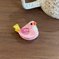 Mini bird hair claw