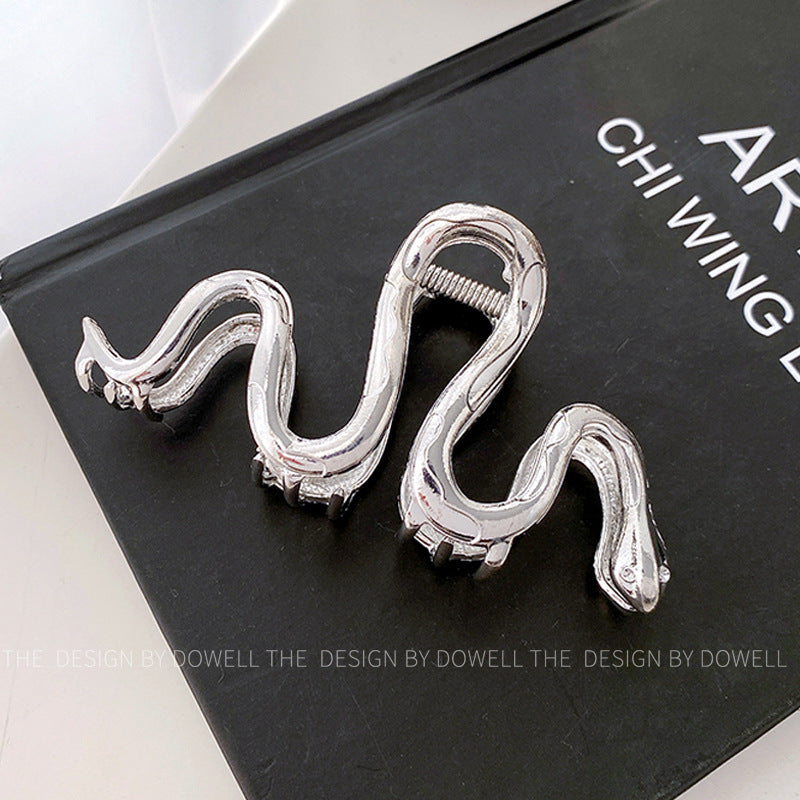 snake-shaped metal hair claw